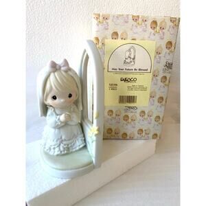Precious Moments porcelain figurine titled "May Your Future Be Blessed Enesco